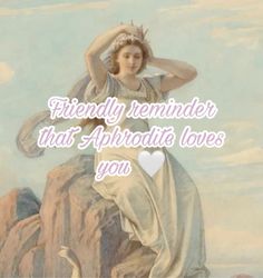 a woman sitting on top of a rock next to a painting with the words friends reminder that aphrodia loves you