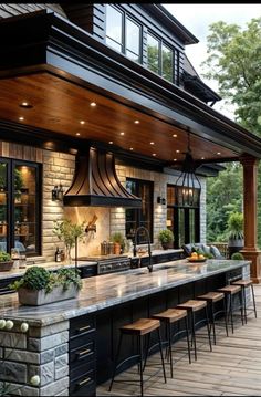 an outdoor kitchen with lots of counter space