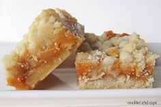 two pieces of cake sitting on top of a white plate