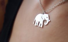 YOU CAN TAKE A LOOK AT THE OTHER ELEPHANTS FROM MY STORE BY CLICKING THIS LINK: https://www.etsy.com/es/shop/Liviston?section_id=24989656 ELEPHANTS NECKLACE. SOLID STERLING SILVER Each item is handmade to order in solid 925 Sterling Silver in my workshop in Spain, giving each piece a unique meaning that is specific and special to you. It has undergone quality control so you can share a long life together. Elephant measure: Thick: 0.04 inches (1 mm). High: 0.787 inches (2 cm). Wide: 1 inche (2,5 Dumbo Elephant, Single Necklace, Elephant Fashion, Elephant Jewelry, Silver Elephant, Kay Jewelry, Sterling Silver Cat, Amulet Necklace, Elephant Necklace