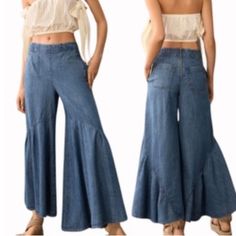 Pilcro High-Rise Ruffle-Hem Culotte Jeans * 100% Cotton * Front Slant Pockets * Back Patch Pockets * Pull-On Styling - Back Zipper * Machine Wash * Imported Dimensions * 12" Rise * 25" Inseam * 31.5" Leg Opening * Nwt * Size 27 Bohemian Dark Wash Bottoms For Spring, Casual Flare Bottoms With Ruffles, Casual Ruffled Flare Bottoms, Bohemian High Rise Bottoms For Spring, Bohemian High-rise Bottoms For Spring, Bohemian Flare Jeans For Summer, Bohemian Light Wash Bottoms For Spring, Bohemian Style Light Wash Bottoms For Spring, Spring Dark Wash Ruffled Bottoms