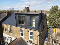 an aerial view of the roof of a brick building