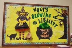 a bulletin board with an image of a witch holding a broom