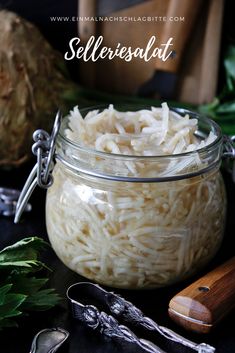 a glass jar filled with shredded white noodles