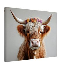 a cow with flowers on it's head is looking at the camera