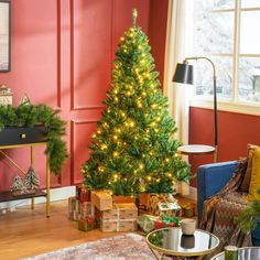 a living room with a christmas tree in the corner