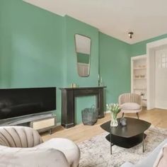 a living room filled with furniture and a fire place