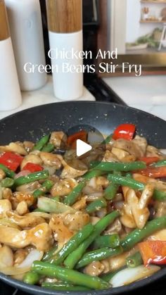 chicken and green beans stir fry in a skillet