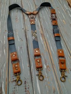 Suspenders Women  Blue Suspenders  Women Leather Suspenders Leather Suspenders  Leather Suspenders For Women  Rustic Suspenders  Suspenders gift Women's suspenders  Length suspenders  from 104-106 cm.+-2 cm  40.94 -41.73 inch +- 0.78 inch. Width leather 2.5 cm. - 0.98 inch. Metals: copper,brass. Materials: bead Leathers colors: Blue/Tan. Clips from stainless steel on the suspenders are very strong. Individual orders for leather suspenders are accepted. Write me your size before ordering. Leather suspenders are made entirely by hand from creating an idea, cutting leather, selecting colors, applying paints to it and to metal fittings that are made entirely by hand from forged copper and brass.  Choose the option of suspenders with clips or with carabiners. clasps. You can also change the ele Suspenders Women, Suspenders Pants, Blue Suspenders, Leather Suspenders, Suspenders For Women, Smart Trousers, Copper And Brass, Bead Leather, Women Leather