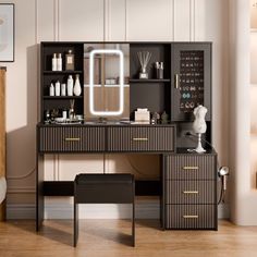 a vanity with lighted mirror and drawers in a room next to a chair, stool and table