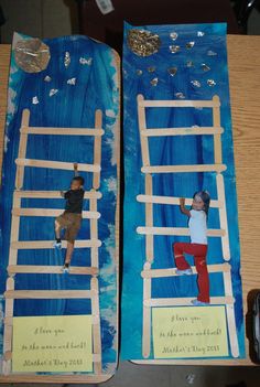 two children are climbing on the ladders made out of paper