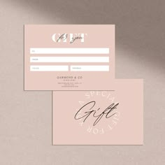 two business cards with handwritten calligraphy on the front and back, both in pink