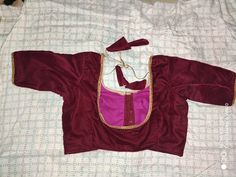 This is a very beautiful handmade Maroon blouse for women and girls. you can wear this blouse on occasions like diwali, wedings, engagement, anniversaries etc. this blouse can be used for gifting purpose also. this trendy beautiful blouse can give your personality a elegant look. you can wear this blouse with very beautiful sarees and lehangas. we will do the customization also as per the customer need. free shipping worldwide Designer Cotton Silk Blouse With Gota Work, Anarkali Blouse With Gota Work, Festive Cotton Silk Blouse With Gota Work, Raw Silk Gota Work Blouse, Silk Blouse Piece With Gota Work For Navratri, Raw Silk Blouse With Gota Work In Traditional Drape, Traditional Drape Blouse In Dola Silk With Gota Work, Festive Blouse With Gota Work And Traditional Drape, Designer Chanderi Blouse With Gota Work