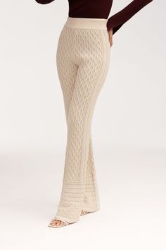 The Vanessa Diamond Knit Wide Leg Pants are the epitome of luxury and comfort. Crafted from a diamond knit structure and crafted from a cozy knit, these pants are super soft and stretchy, perfect for those days when you want to feel stylish and comfortable. With a high rise for a flattering fit, these pants are the ideal choice for any lap of luxury. Knit Bottoms For Winter Lounging, Knit Trousers, Luxury Fitted Knit Bottoms, Cozy Knit Wide-leg Pants, Winter Full-length Knit Pants, Knit Wide-leg Loungewear Pants, Knit Structure, Summer Pants, Knit Pants