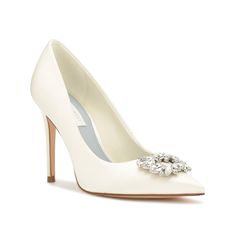 Nine West-Fana Pump The Fana pump from Nine West is the perfect complement to your party look. Attractive crystal embellishment on the pointed toe accentuates the appeal of this slip-on fashioned with a towering stiletto heel for a striking elegance. Ivory Pumps, Bridal Pumps, Shoes Bride, Pointy Heels, Wedding Shoes Bride, Designer Pumps, Crystal Brooch, Pump Dress, Embellished Dress