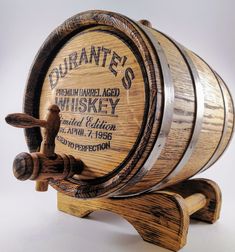 a wooden barrel that is sitting on a stand