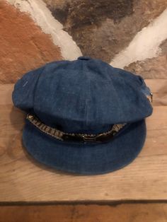 Vintage denim, newsboy style hat with side pocket in good condition Vintage Hats With Curved Brim In Medium Wash, Vintage Denim Blue Hat With Curved Brim, Vintage Curved Brim Denim Blue Hat, Vintage Denim Brimmed Hat, Vintage Brimmed Denim Hat, Vintage Denim Cap, Casual Denim Flat Cap, Vintage Denim Blue Cap, Newsboy Hat