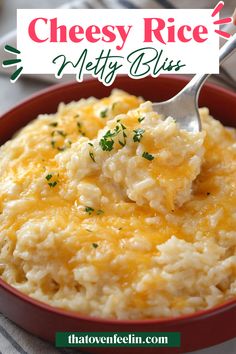 a red bowl filled with mashed potatoes topped with cheese and parsley on top