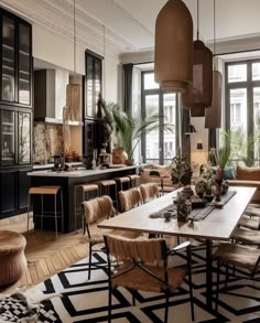 a large dining room with lots of furniture and plants in it's centerpieces