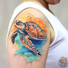 a woman's arm with a turtle on it and clouds in the sky behind her