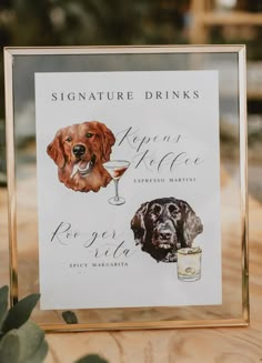 a sign that says signature drinks with two dogs and a wine glass in front of it