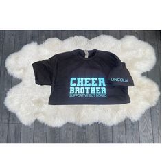 Customizable Cheer Brother T-shirt, with athletes name on the sleeve. Brother Cheer Shirts Boys, Cheer Shirts, Boys T Shirts, Boy's Clothing, Ships, Tops & Tees, Top Outfits, T Shirts, Sports