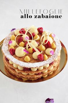 a cake with nuts and raspberries on top