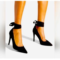 A Pointed-Toe Pump With A Wraparound Ankle Strap. Material: Faux-Suede Features: Sd Dream Sole - Double The Padding For Comfort, Support, And Ease Of Movement Outside Heel Height: 4" Closure: Ankle Ties Color: Black Caviar Brand New, In Box Suede Pointed Toe Heels For Night Out, Ankle Tie Synthetic Heels For Party, Trendy Ankle Tie Heels For Night Out, Ankle Tie Synthetic Heels For Formal Occasions, Formal Ankle Tie Heels In Synthetic Material, Formal Ankle Tie Heels In Synthetic, Trendy Evening Heels With Ankle Tie, Chic Ankle Tie Heels For Night Out, Trendy Ankle Tie Heels For Evening