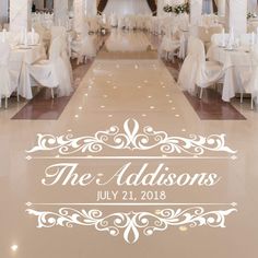 the wedding reception hall is decorated with white linens