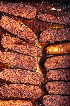 the meat is covered in sauce and ready to be cooked on the grilling pan