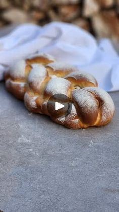 a loaf of bread is covered in powdered sugar