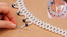 someone is making a beaded necklace with pearls