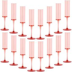 a set of twelve pink goblets sitting side by side on top of each other