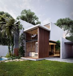 the modern house is surrounded by greenery and has an open floor plan that allows for easy access to the backyard