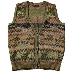 Vintage 90s Coogi Style Cardigan Vest Sleeveless Sweater for men - Classic Retro Knit Dive into the nostalgia of the 90s with this eye-catching vintage Coogi style v cardigan sweater! Inspired by the iconic designs of Coogi Australia, this sweater features the same bold patterns and vibrant colors that defined an era. Perfect for fashion lovers who appreciate unique, statement pieces. Features: Era: 1990s Style: Coogi-inspired Material: High-quality cotton blend (Soft, warm, and durable) Design: Y2k Sleeveless Winter Vest, Vintage Winter Sweater Vest, Retro Sleeveless Sweater For Winter, Retro Sleeveless Winter Sweater, Vintage Sleeveless Sweater For Winter, Vintage Sleeveless Winter Sweater, Vintage Sleeveless Winter Vest, Vintage Multicolor Sleeveless Sweater Vest, Retro Fitted Sleeveless Sweater