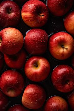 many red apples with water droplets on them