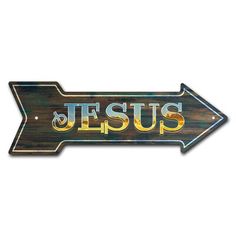 a wooden arrow sign with the word jesus painted on it