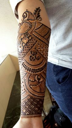 a person with a tattoo on their arm