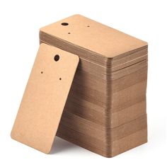 several cardboard boxes stacked on top of each other with holes in the front and bottom