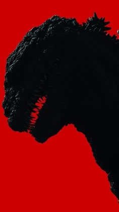 the silhouette of a large black animal against a red background with text that reads godzilla