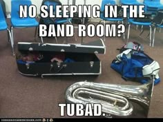 there is no sleeping in the band room? tubad music instruments and bags on the floor