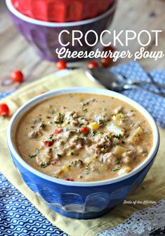 crockpot cheeseburger soup in a blue bowl on a yellow and white napkin