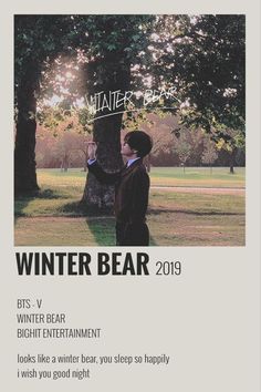 an advertisement for winter bear, featuring a man standing in front of a tree with the words winter bear written on it