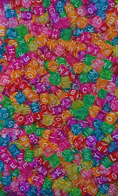 many colorful letters and numbers are scattered together