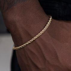 Introducing the Palm Chain Bracelet in Yellow Gold, the bolder 4mm version. This versatile 18k Yellow Gold bracelet features a braided rope design that will instantly level up your look. This piece is ideal for stacking and accessorizing any outfit- day or night. Pair it with the Palm Chain in 4mm for the perfect matching set! This product is guaranteed for life – GLD will repair or replace the item should you experience any defects in craftsmanship or breakage. Specifications - Width: 4mm - Len Modern Braided Jewelry For Everyday, Classic 14k Gold Bracelet With Wheat Chain, Elegant Everyday Braided Bracelets, Everyday Yellow Gold Rope Chain Bracelet, Classic Rope Chain Bracelet, Everyday Yellow Gold Jubilee Braided Bracelet, Classic Gold Bracelet With Rope Chain, Classic Gold Rope Chain Bracelet, Classic 14k Gold Bracelet With Rope Chain