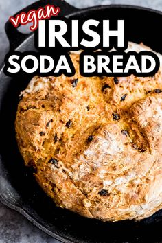 a loaf of soda bread in a cast iron skillet with the words vegan irish soda bread