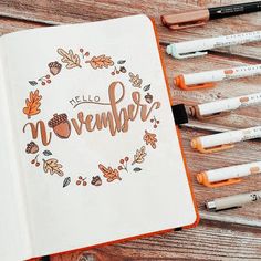 an open notebook with the words hello november written in it