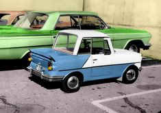 two old cars parked next to each other in a parking lot, one blue and the other green