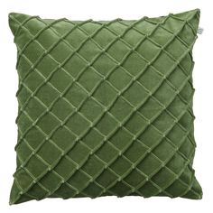 a green pillow with diamond stitching on the front and back, sitting on a white background