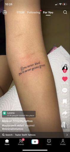 a person with a tattoo on their arm that says, if you never read your own book